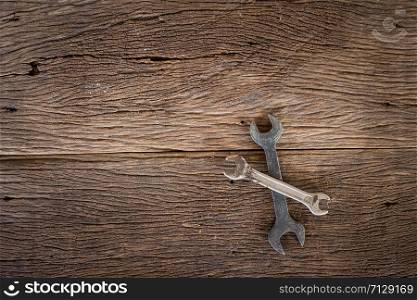Tools on wooden background.