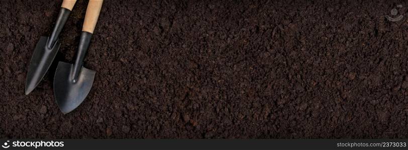 Tools soil for planting on soil background horizontal with copy space