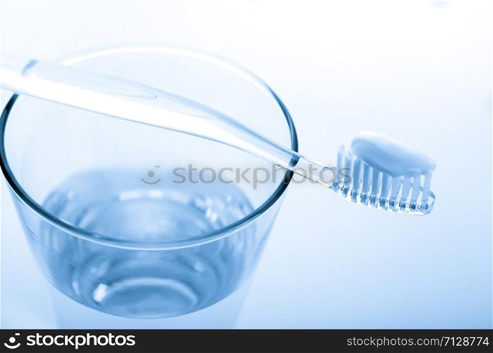 tooth brush in glass Isolated on white background