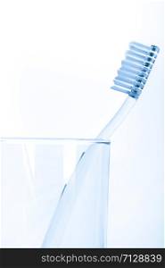 tooth brush in glass Isolated on white background