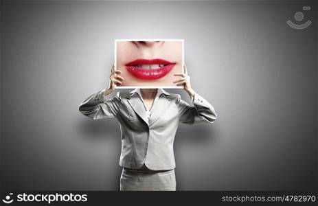 Tooth care. Businesswoman holding banner with macro mouth image