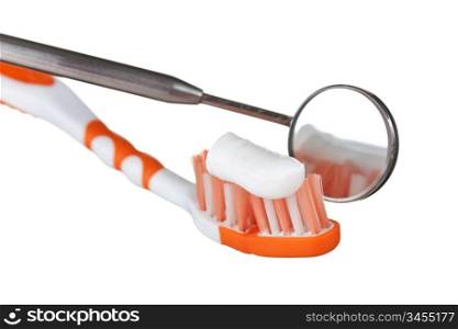 toothbrush and dental Instruments isolated on a white background