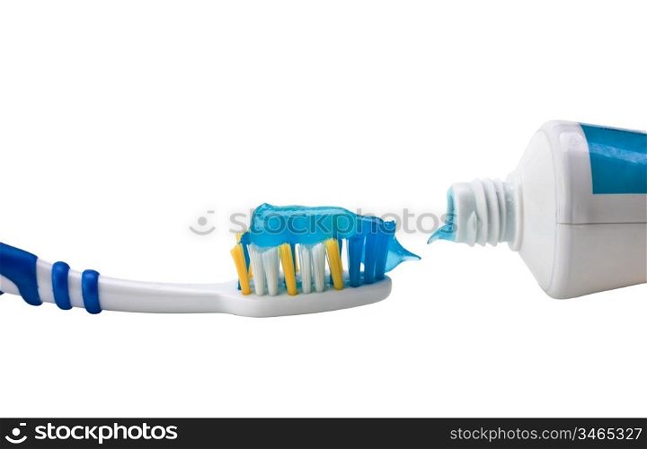 toothbrush and toothpaste isolated on a white background