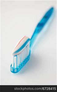 Toothbrush loaded with toothpaste
