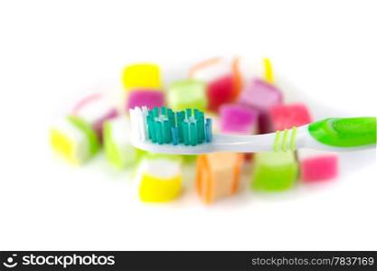 toothbrush on candy background