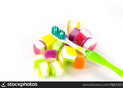 toothbrush on candy background