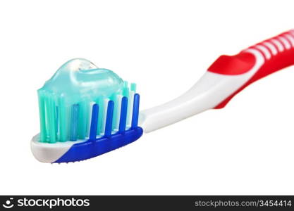 toothbrush with toothpaste isolated on a white background