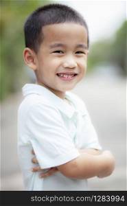 toothy smiling face of asian children happiness emotion face
