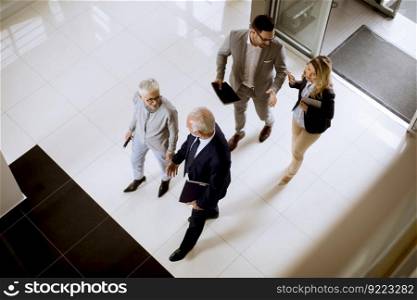 Top angle view at businesspeople colleague team at lobby in office building