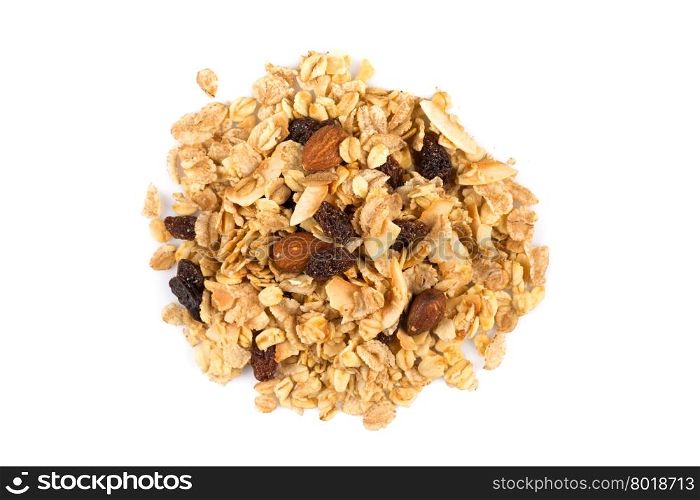 Top close view of a dry mix of fruit and almon nuts cereal on white
