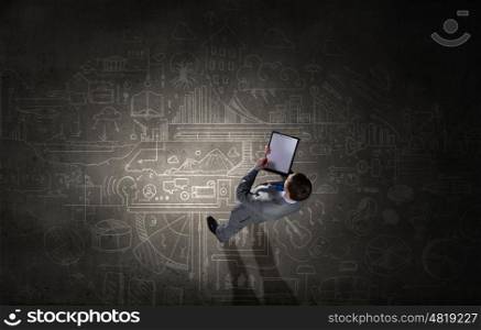 Top manager. Top view of a businessman with folder in hands