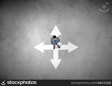 Top manager. Top view of a businessman with folder in hands