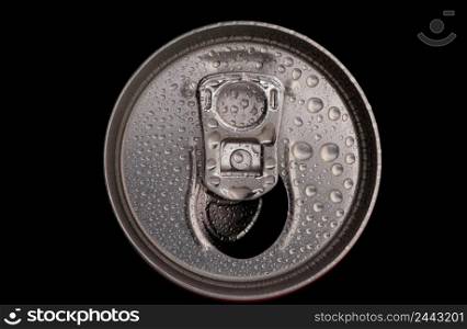top of a can tin with water drops close-up on a black background. tin cans closeup
