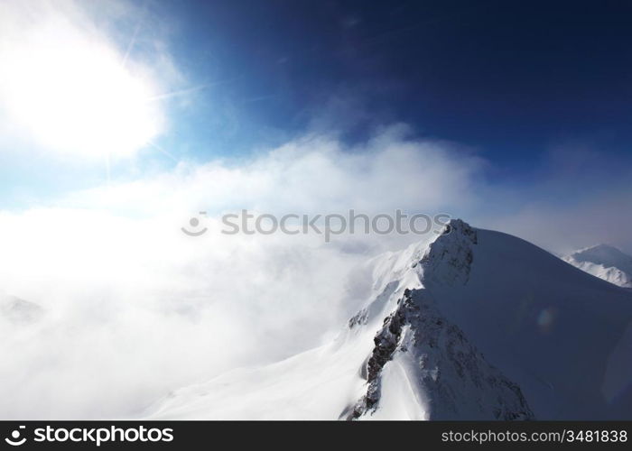 top of alps in sky