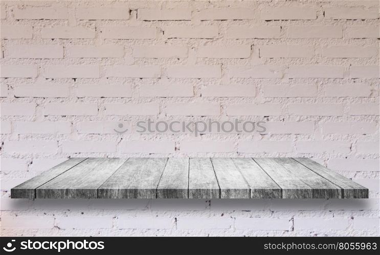 Top of black and white wooden shelf with white brick wall decorated in coffee shop