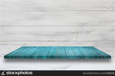 Top of blue wooden shelf with white wooden wall background. For product display