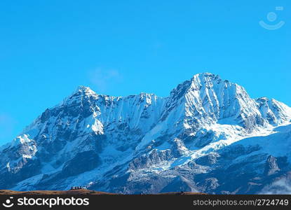 Top of High mountains, covered by snow. Kangchenjunga, India.