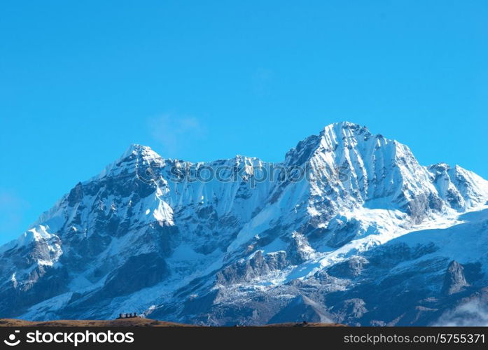 Top of High mountains, covered by snow. Kangchenjunga, India.