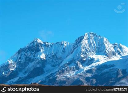 Top of High mountains, covered by snow. Kangchenjunga, India.