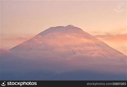 Top of Mountain Fuji with clouds in sunset