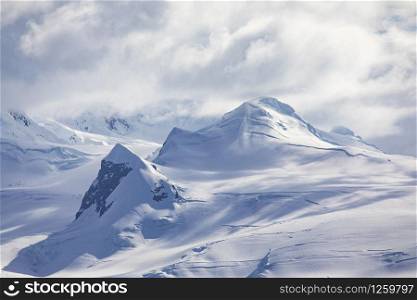 Top of mountain range with snow and ice near South Pole in Antarctica