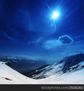 top of mountains in blue sky