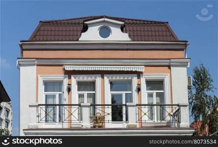 Top of small private two-storied residential house with balcony in Odessa, Ukraine