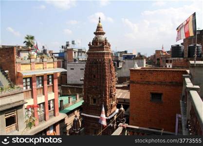 Top of stupa inside residential district of Patan, Nepal
