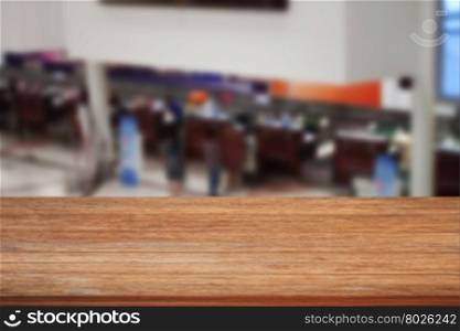 Top of wooden table on blurred background of Airport, stock photo