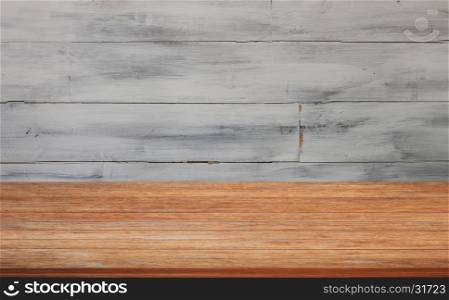 Top of wooden table with white wooden wall background. product display template