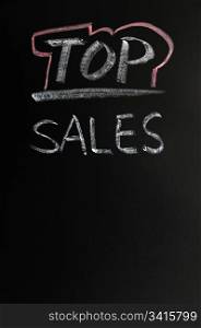 Top sales written in chalk on a blackboard