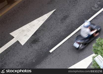 Top shot of blur motion motorcycle on road during rush hour