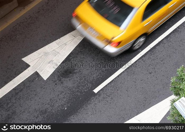 Top shot of blur motion taxi on road during rush hour