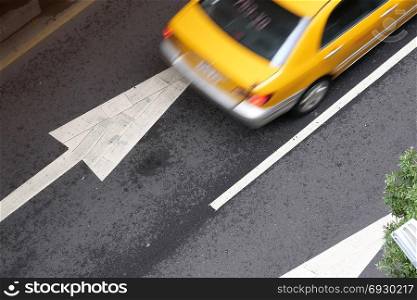 Top shot of blur motion taxi on road during rush hour