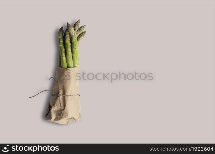 Top up up view fresh asparagus isolated on grey background. suitable for your design project.