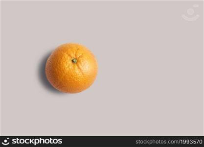 Top up up view fresh orange isolated on grey background. suitable for your design project.