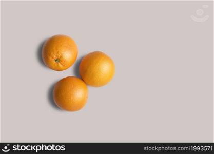 Top up up view fresh oranges isolated on grey background. suitable for your design project.