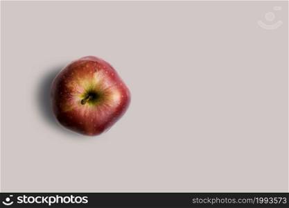 Top up up view fresh red apple isolated on grey background. suitable for your design project.