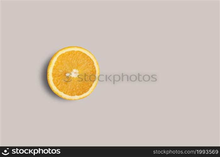 Top up up view fresh slice orange isolated on grey background. suitable for your design project.