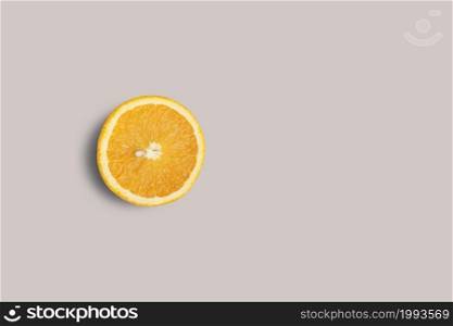 Top up up view fresh slice orange isolated on grey background. suitable for your design project.