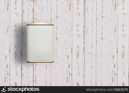 Top up up view white tea tins isolated on white wooden background. suitable for your design project.