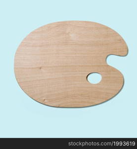 Top up up view wooden palette isolated on blue background. suitable for your design project.