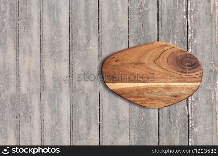 Top up view cutter board on dark wooden vintage table . added copy space for text , suitable for your food or drink concept background.