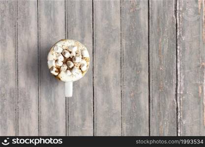 Top up view italian cappuccino on dark wooden vintage table . added copy space for text , suitable for your food or drink concept background.