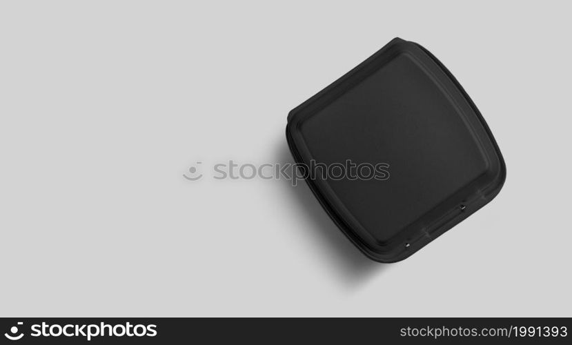 Top up view of blank black styrofoam isolated on grey. eco food lunch concept.