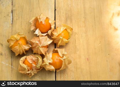 Top view and close up orange organic cape gooseberry fruit