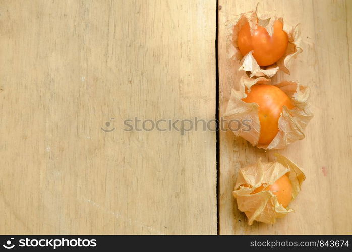 Top view and close up orange organic cape gooseberry fruit