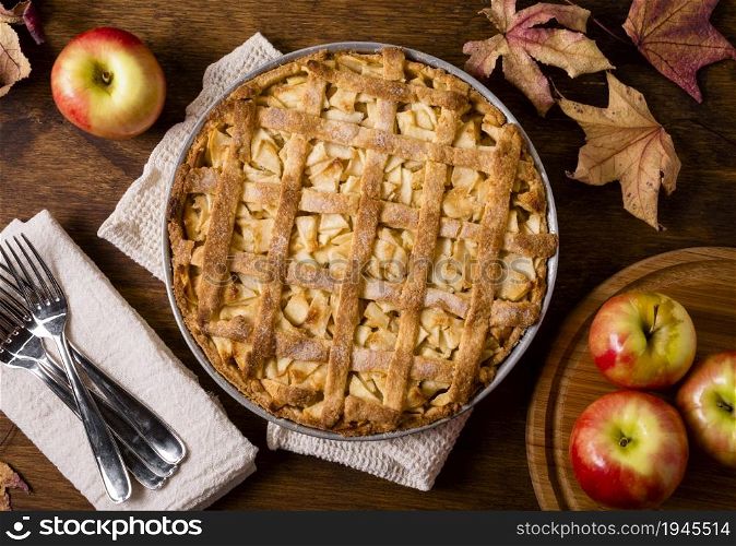 top view apple pie thanksgiving with cutlery leaves. High resolution photo. top view apple pie thanksgiving with cutlery leaves. High quality photo