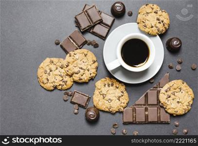 top view arrangement with cookies chocolate candies coffee