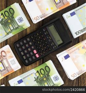 top view arrangement with money pocket calculator